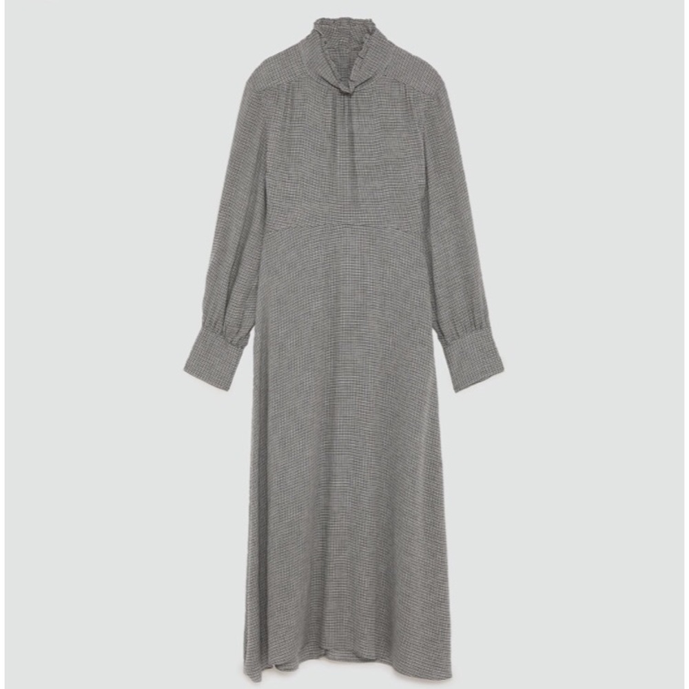 Flowing dress with high collar